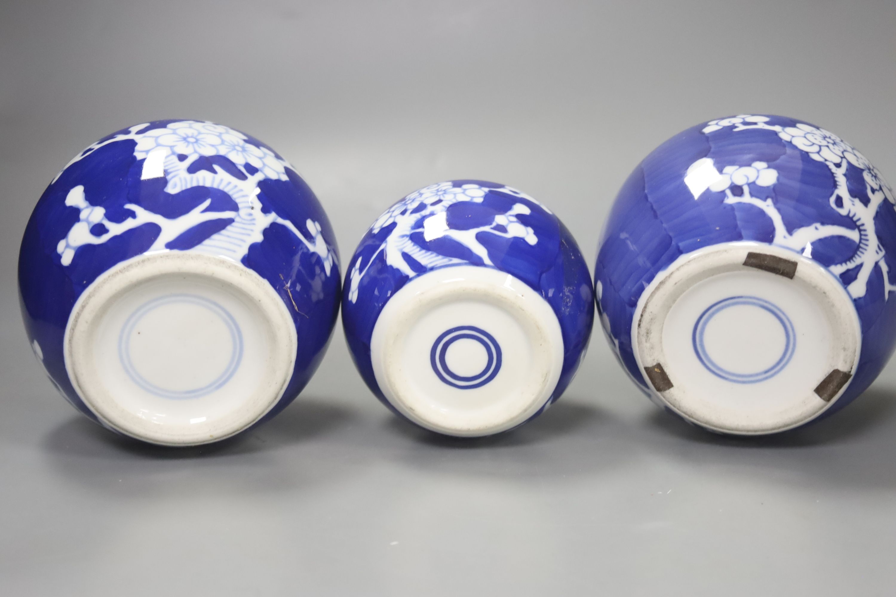Two pairs of Chinese jars, one pair with covers, two other jars and a blue and white vase and cover, height 26cm